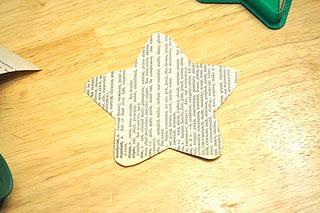 Ribbon Cut-Paper Ornament 1) Using pages from an old book, trace a