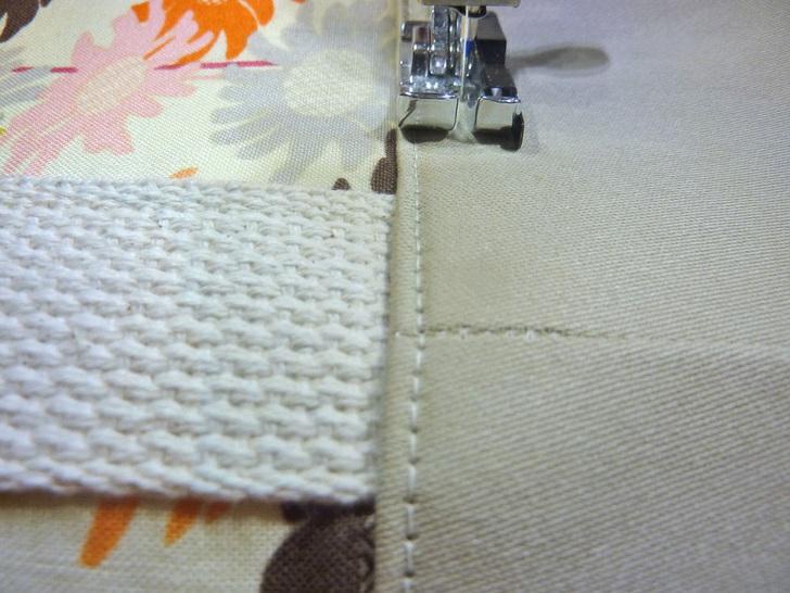 Pin across the bottom edge. 12. Re-set the stitch length to normal.