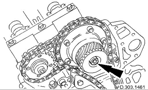 18. Loosen the bolt which secures the sprocket to the camshaft. 19.