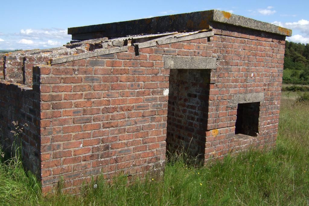 5 Site Description 5.3.2 C BUILDINGS C type buildings are usually brick built with corrugated asbestos roofs.