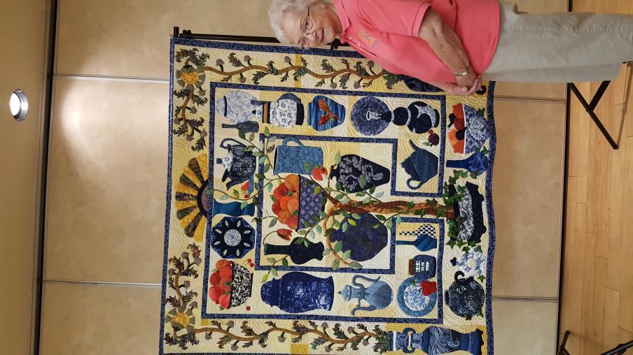 Ann brought in this gorgeous quilt and told us about it. This story tells a lot about friends also. Maggie Walker saw pottery pots, pitchers, etc.