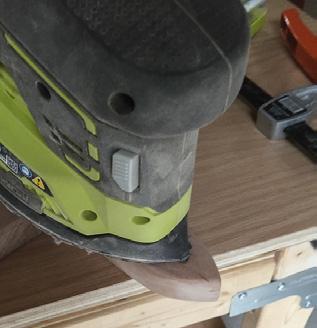 10 With the Corner Cat Finish Sander, use the tip to soften the edges of the hole.
