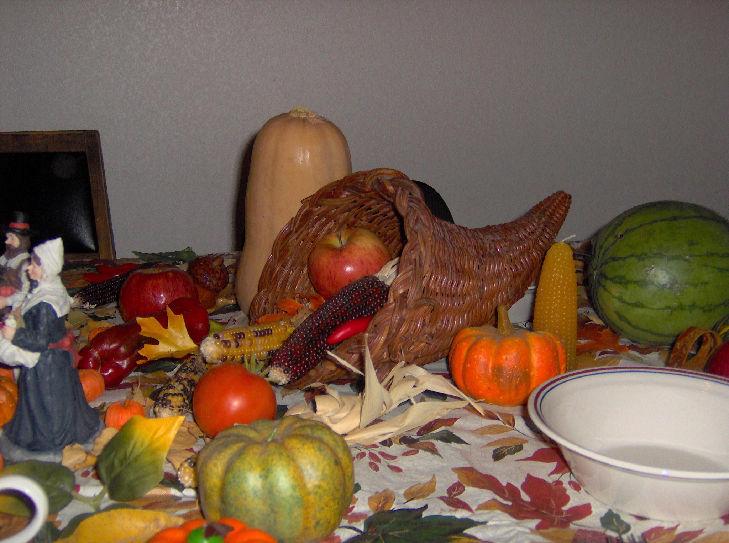 In the cornucopia above, Jonathan set an apple on top of Indian corn and fall leaves.