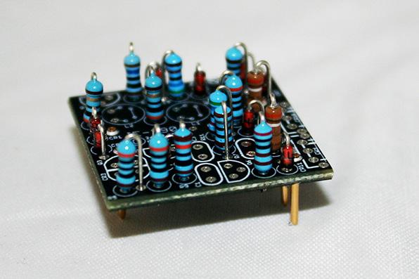 Although the resistors are not polarized, to avoid leads touching and shorting, you should install them so that the