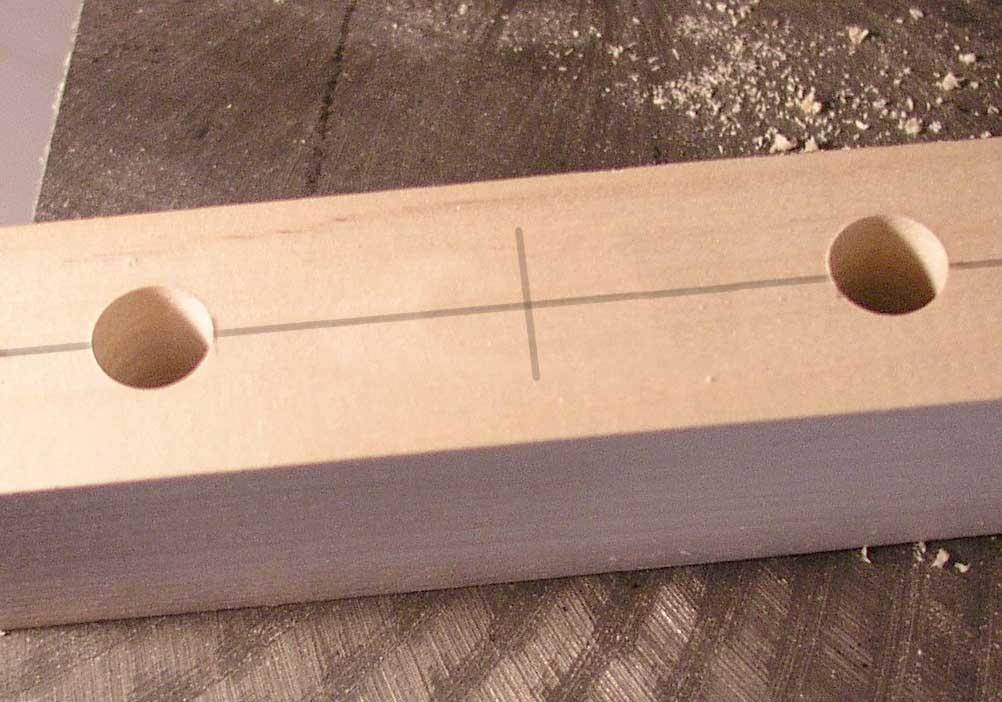 STEP 4: DRILLING THE MOUNTING SCREW HOLES There are two options for drilling mounting screw holes; the first option is for Les Paul-style guitars - where the headstock is perfectly symmetrical - the