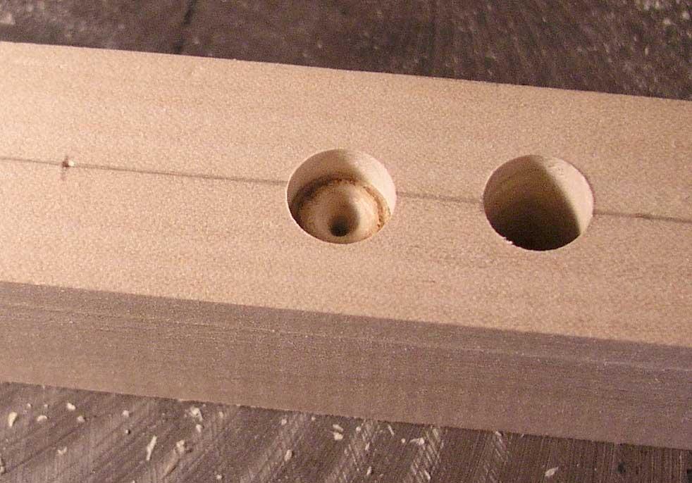 STEP 4: DRILLING THE MOUNTING SCREW HOLES Using your drill press or power drill, line up the point of your drill bit with your center punch hole and drill right through your base.