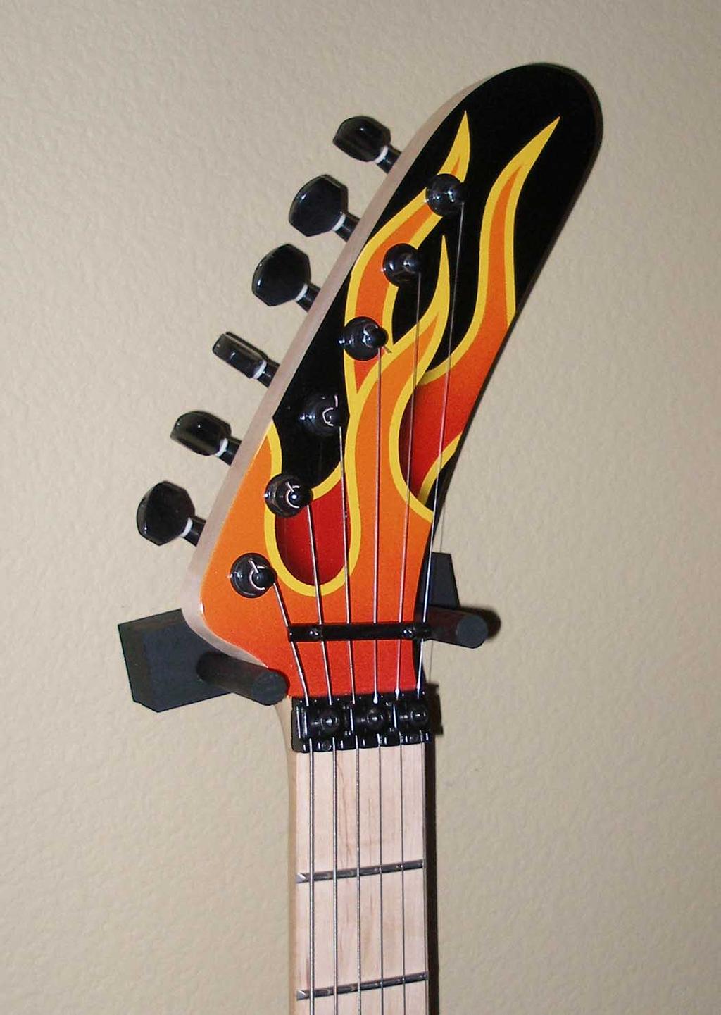 INTRODUCTION As the guy behind PAINTYOUROWNGUITAR.COM and someone who s been painting guitars for over 20 years, I have more guitars and more guitar parts than you could imagine.