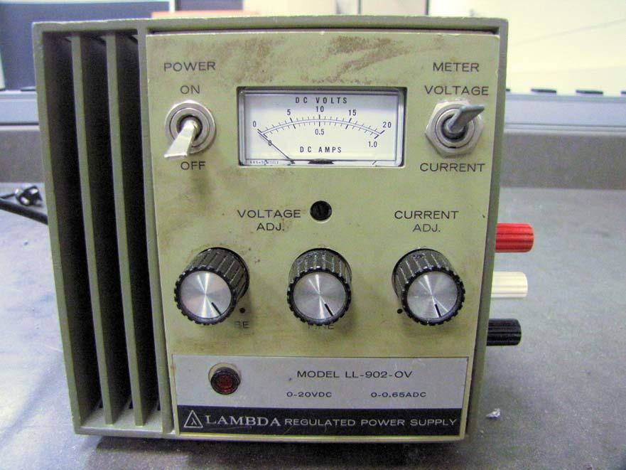 4 Figure 3 shows the Lambda model LL-902-0V power supply you will use. The power switch turns it on and off. The meter switch determines whether the moving-needle meter is reading voltage or current.