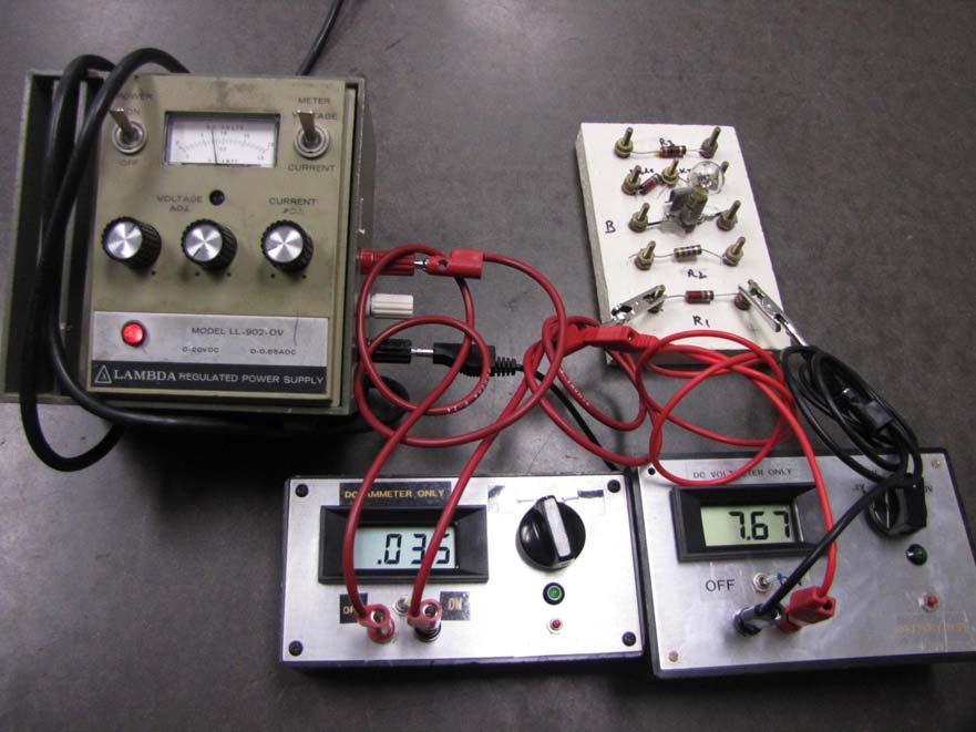 7 Figure 7 shows a completely wired setup doing an I-V measurement on resistor R1. Note that the power supply meter switch is on voltage, and its needle indicates around 7 to 8 V.