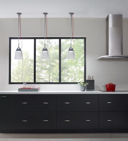 Page 2 Karif line-voltage pendants by LBL Lighting are shown in this kitchen.