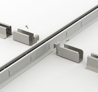 The grid profiles are made from galvanized Z100 steel and painted white as standard. The system is intended to be suspended from soffits using nonius hangers.