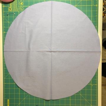 Fold the lining twice so the centre of the square is in the bottom left corner.