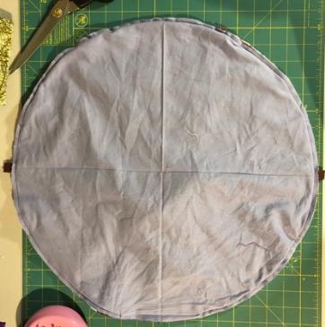 Cut out the quarter circle and unfold the lining to a circle that should be the same