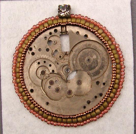 Using color B 150 seed beads, work a round of beaded backstitch between the 80s and the watch plate.