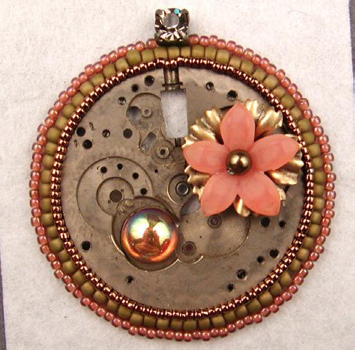 [4] Determine where you want to attach a Lucite flower, and sew up through the foundation and the corresponding hole in the watch plate.