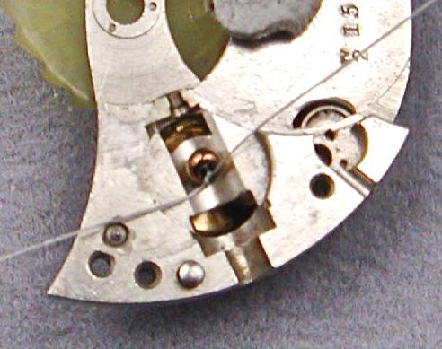 Sew through a hole in the watch plate, and pick up the accent bead and a B 150.