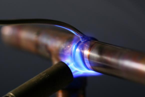 In brazing, the filler metal melts at a higher temperature, but the work piece metal does not melt.