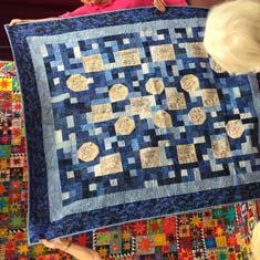 We plan to aim for 20 to 30 quilts.