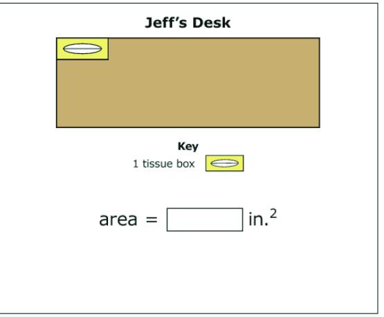 Jeff measures his desk.