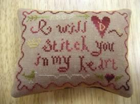 And here are two staff models: Bunny's "I Will Stitch You in My Heart" pincushion, stitched on 40c with Belle Soie.