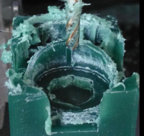 1 mm tip diameter for finishing Figure 12: Crack due to over clamped 2.2.3 Resin Machining Learning from the experience, the use of resin was tried to realize the design, and the result is shown in fig.