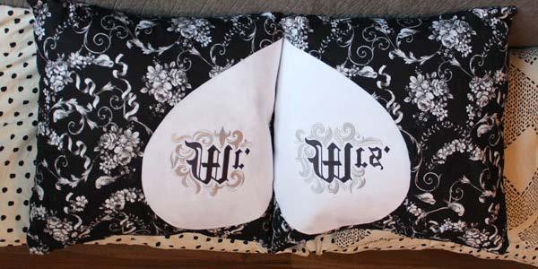 Two embroidered pillows create the shape of a heart when displayed together. Use to decorate your home, or give as a wedding gift!