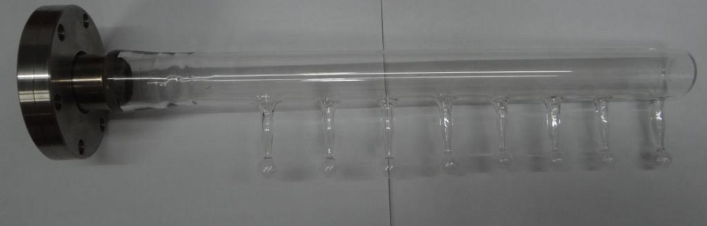 A manifold that can be connected to UHV system consisting of borosilicate glass bulbs is shown in Fig. 14.