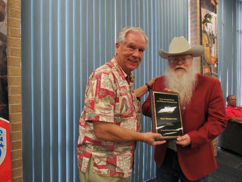 Sheryl McBroom took the photo on the right showing Chief Organizer Jim Hollingsworth (red jacket) presenting the award and title of Texas Military Veterans Champion to Charles Fricks.