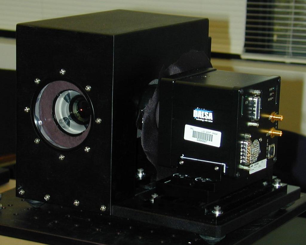 4. EXPERIMENTAL DEMONSTRATION Figure 4 shows on the left a picture of the prototype built following the lens prescription from the final optical design. The SLM is a 7.68 7.