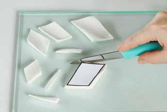 Now, roll over all the stones with the acrylic roller lengthwise along the diagonal so that you are left with a curved recess in the middle.