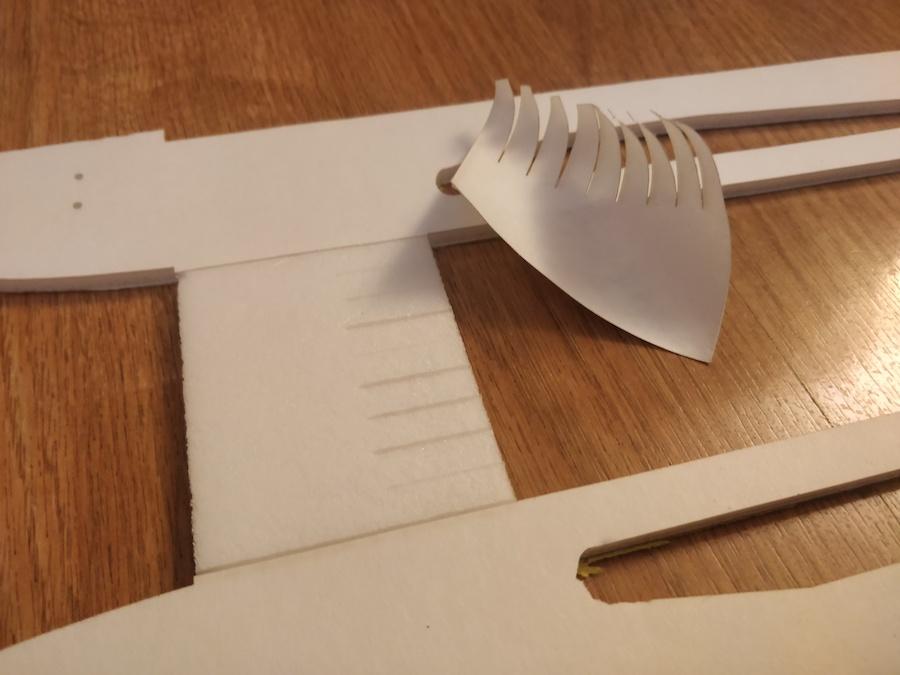 Similar to the FT Mini Mustang s build process, pre-fold the belly piece, place it underneath the fuselage and crack open