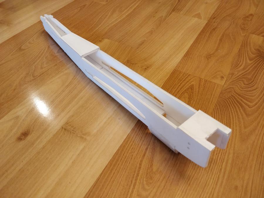 front fuselage. Glue it in using a ruler or a scrap piece of foam to guide the curve.