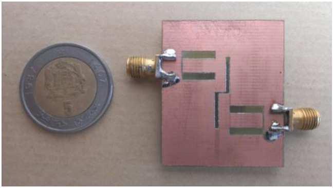1 GHz is thus achieved. The prototype structure of three-pole N lines BPF with three-cell DGS is fabricated on FR4 substrate with a relative dielectric constant of 4.3 and a thickness h of 1.58 mm.