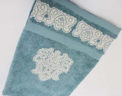 Arrange the lace designs any way you like to create a custom design for your towels.