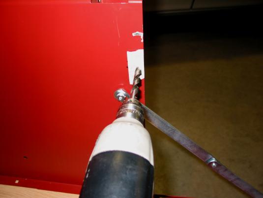 28. Center-punch this mark and drill a 3/8 diameter hole. 29.