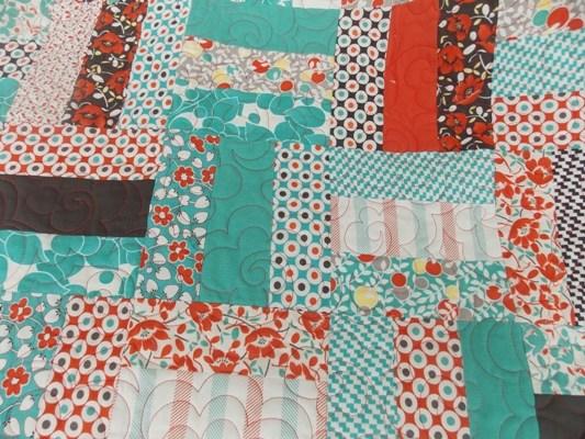 it from your scraps you can make this size of quilt with 105 ~ 2 1/2 strips. Now queen sized 96 x 96 You would need a 16 x 16 layout. That would be 256 blocks.