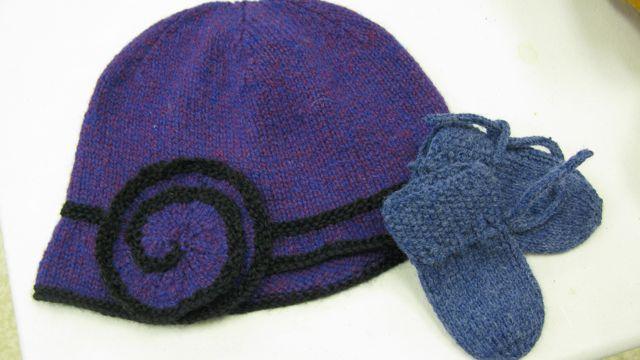 Carol J s hat and baby mitts.