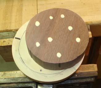 wooden face plate so that it can be glued on center