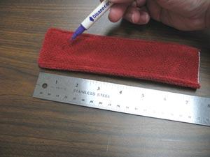 Sew a 1/4 inch seam along the sides and one end (leave one end open for turning).