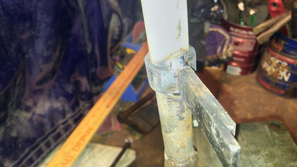 11. Once you have the band properly positioned weld it (not much is needed if you want to look factory) both on the top and bottom where the two halves come together and meet the downtube.