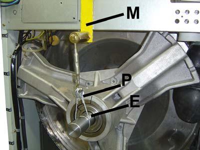 - Tighten cable P until the bearing box is centred with the outer drum. (fig. 23). - Push the bearings box towards the inside until it fits into the central studs at the bottom of the outer drum.