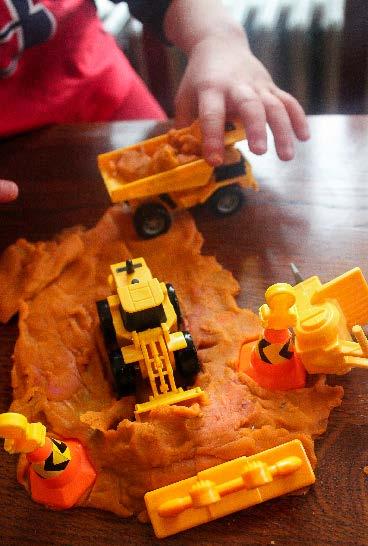 Drive the trucks through the play dough for lots of pretend play!