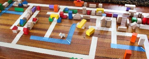 Make a Tape City painter s tape blocks toys Tape roads or train tracks on the floor. Add blocks and toys to make buildings around the city.