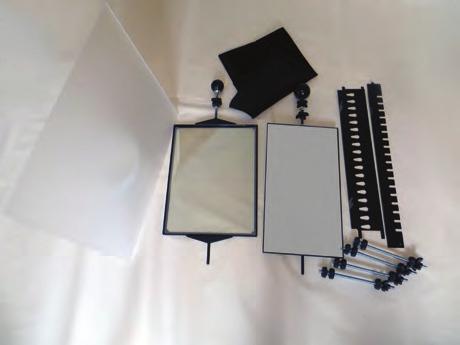 The acrylic plastic board and the two light sources with diffusion filters give an