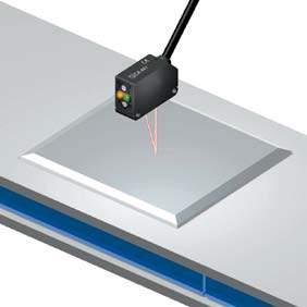 uneven surfaces when sensing objects present on a conveyor belt.