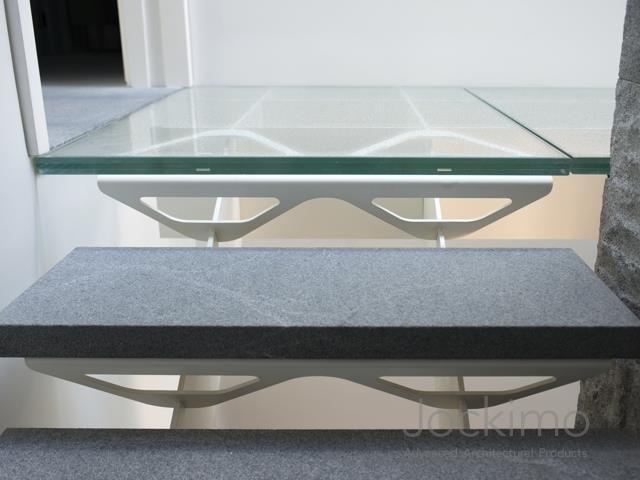 Glass flooring, typically in panels of 10.8 square feet (one square meter), are available clear or colored.