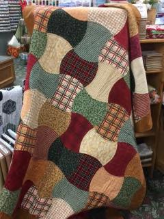 Oversized units are trimmed to a perfect size with perfect seam placement using this tool. This quilt looks great using any collection of fabrics. Twin, full & queen sizes! Pattern & supplies extra.