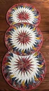 SEASONAL TABLE / BED RUNNER $50 Make this attractive table runner with flying geese circling centre stars.