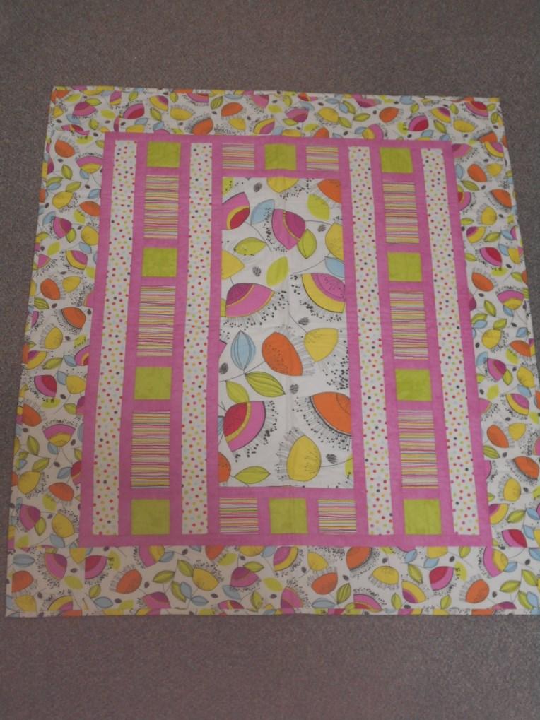 00 5 hrs with Gayle Jones 9:30 3:00 Saturday March 16th Showcase your favorite bright feature fabric with some coordinating spots, stripes and tonal prints to make this fast fun quilt.