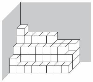 22. This drawing shows cubic boxes stacked in the corner of a warehouse. If each box will hold 8 cubic feet, what is the total capacity of the stack of boxes?